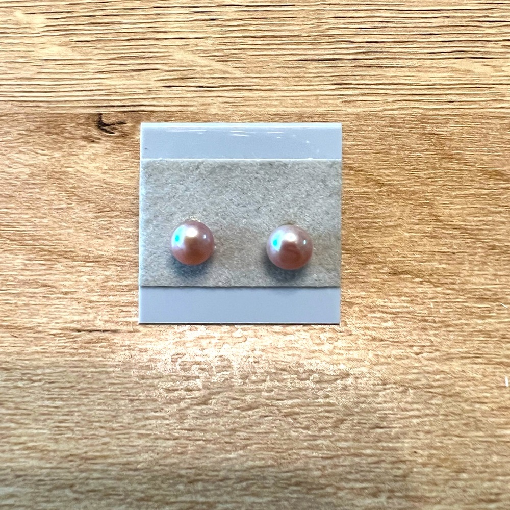Pink Pearl stud earrings.
